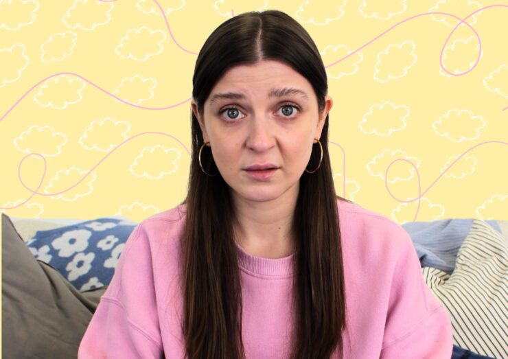 An image of a young woman wearing a pink jumper staring out looking overwhelmed with a yellow background.