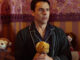 Brian Saffi, looking concerned and holding a teddy bear