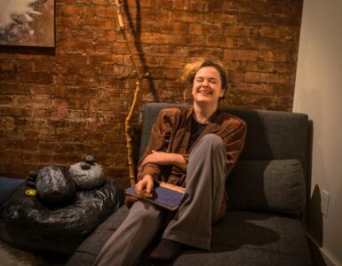 A photo of a woman laughing